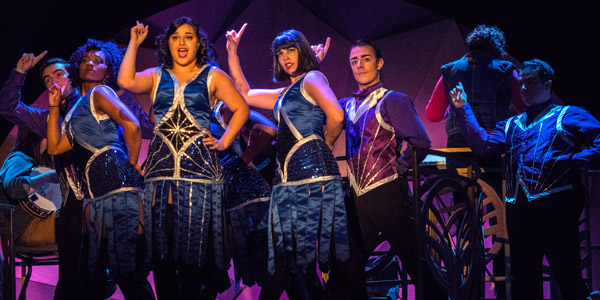 Students singing and dancing in musical 'Chicago'